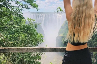 Experience victoria falls from the zambia side on a guided tour with local stories, snacks, and a visit to the art & crafts center. includes pickup.