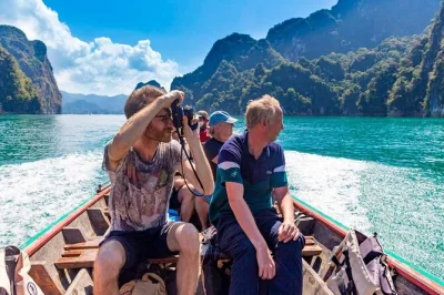 Experience khao sok’s rainforest and wildlife on a 2-day adventure. includes cheow lan lake, bamboo hut stay, local guide, meals, and hotel pickup.