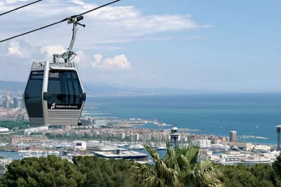 Ride the montjuïc cable car in barcelona with a self-guided audio tour on your phone. includes entry ticket, offline narration, and flexible stops.