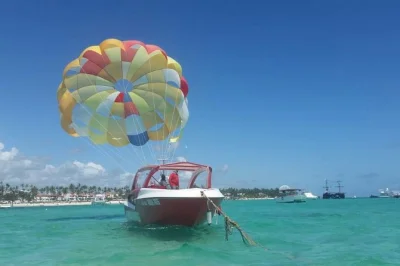 Soar above bávaro beach with a punta cana parasailing tour. enjoy ocean views, coconut palms, and the caribbean breeze. book your flight adventure now!
