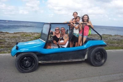 Esplora la natura selvaggia di cozumel in dune buggy, fai snorkeling tra le barriere coralline e gusta un autentico pranzo messicano. guida locale, attrezzatura e pickup inclusi. prenota ora.