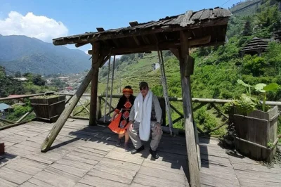 Walk from sapa to cat cat village with a local guide, meet black h’mong families, try snacks, and see the waterfall. includes entry and local treats.