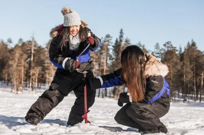 Try ice fishing on a frozen lake near rovaniemi, guided by a local expert. includes hotel pickup, warm gear, and finnish snacks by the fire. book now.